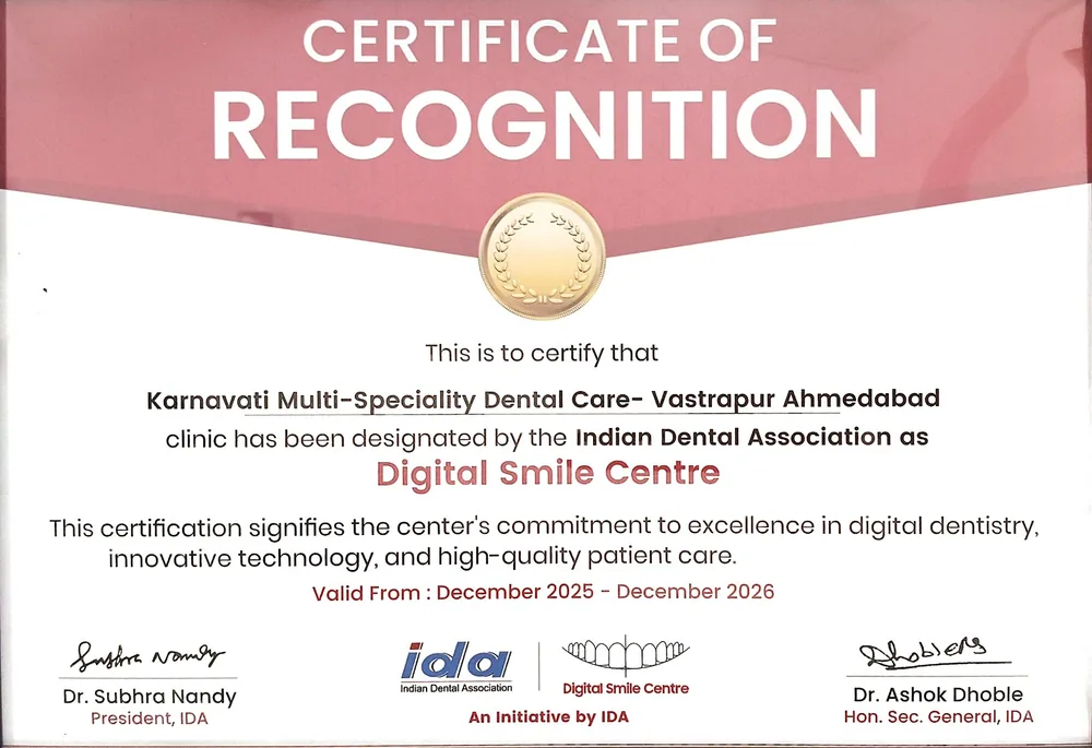 Indian Dental Association Certificate of Recognition designating Karnavati Multi-Speciality Dental Care, Vastrapur Ahmedabad as a Digital Smile Centre, signed by Dr. Subhra Nandy and Dr. Ashok Dhoble